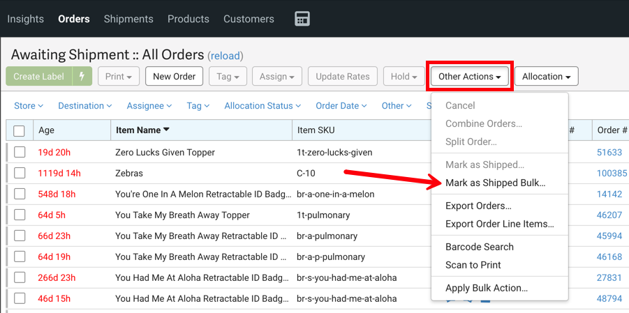 Orders tab. Red box highlights Other Actions dropdown. Red arrow points to Mark as Shipped Bulk option in dropdown